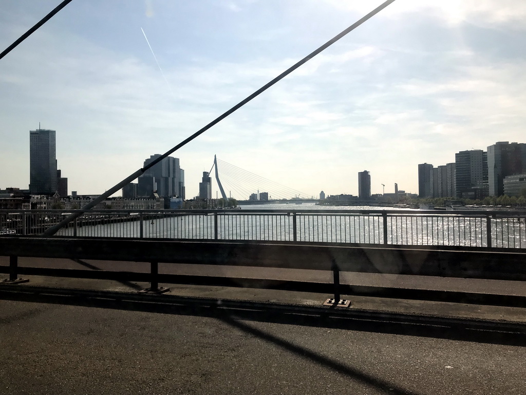 The Erasmusbrug bridge over the Nieuwe Maas river, viewed from the car on the Willemsbrug bridge