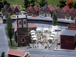 Scale model of a church and market square at Miniworld Rotterdam