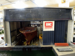 Scale model of Royal IHC building and ship at Miniworld Rotterdam