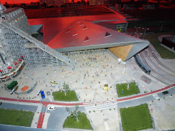 Scale model of the Rotterdam Central Railway Station and the `De Trap` staircase leading from the Stationsplein square to the top of the Groothandelsgebouw building at Miniworld Rotterdam, in the dark
