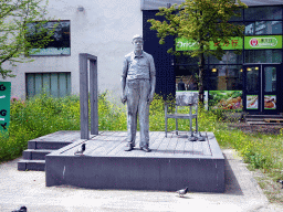 Statue `De Reus van Rotterdam` by Herman Lamers at the park at the West-Kruiskade street
