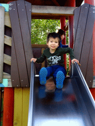 Max on the slide at the playground in front of the theatre of the Vrije Vlucht Voorstelling at the South America area at the Diergaarde Blijdorp zoo