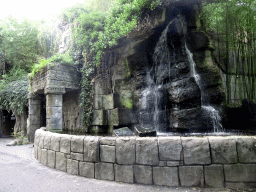 Waterfall and temple relief based on the Angkor Wat temple in Cambodja, at the outside of the Taman Indah building at the Asia area at the Diergaarde Blijdorp zoo