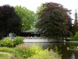 Pond and the front of the Terraszaal restaurant at the Rivièrahal building at the Asia area at the Diergaarde Blijdorp zoo