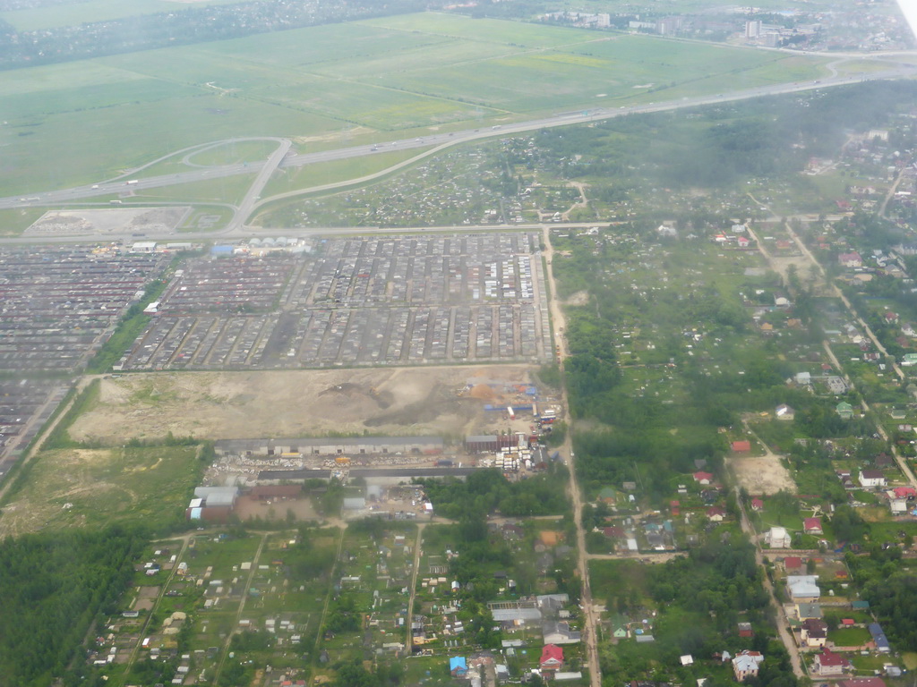 View on parking lots near Pulkovo Airport, from the plane from Tallinn