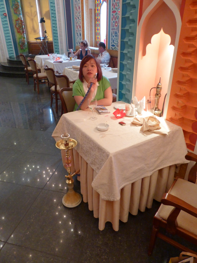 Miaomiao with water pipe in the Baku restaurant at Sadovaya street