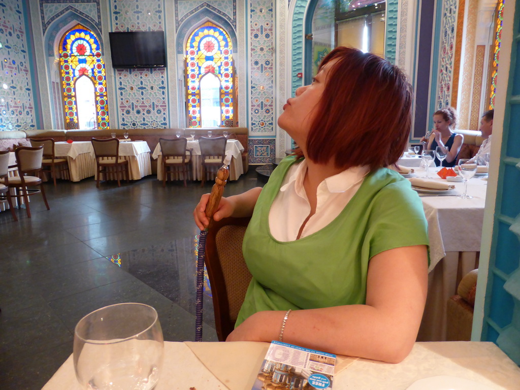 Miaomiao with water pipe in the Baku restaurant at Sadovaya street