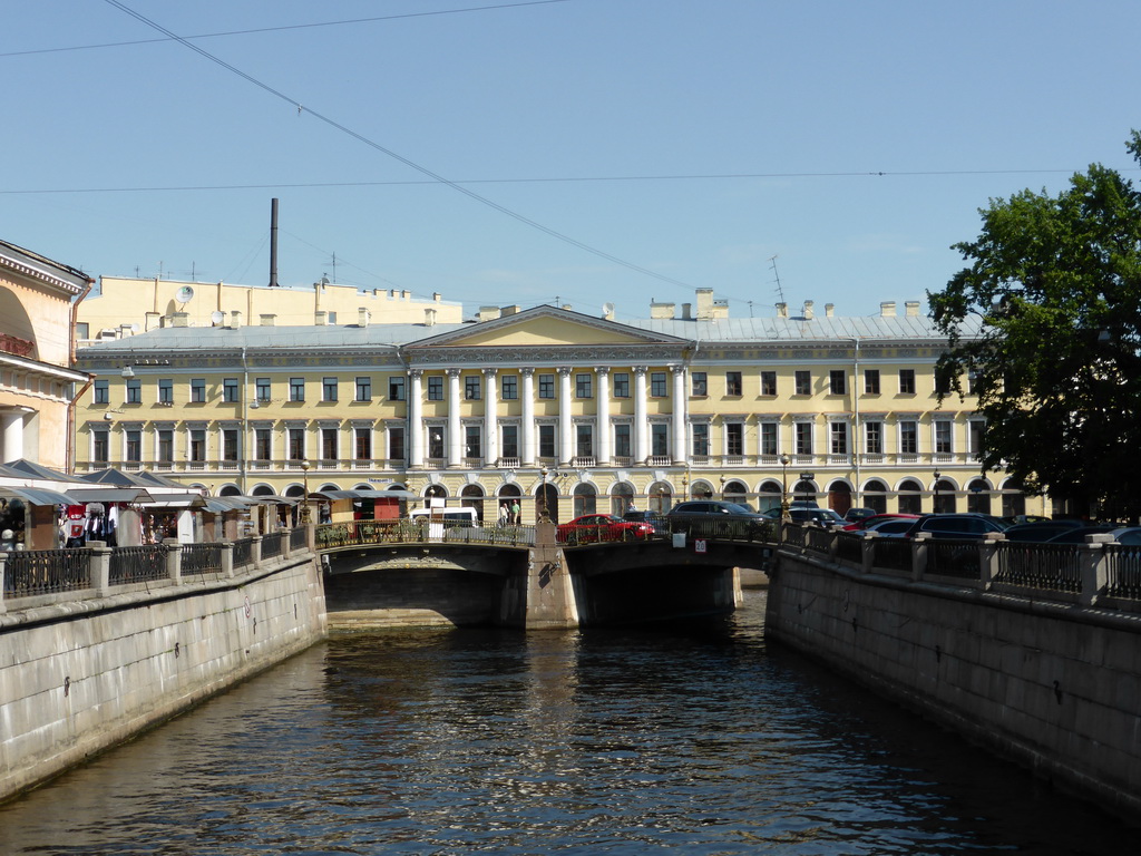 The Teatralny Bridge over the Griboedov Canal and Adamini`s House, viewed from the Novo-Koniushennyi Bridge