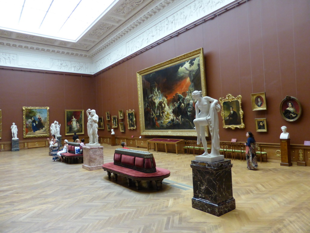 Room with sculptures and the painting `The Last Day of Pompeii` by Karl Brullov, at the Mikhailovsky Palace of the State Russian Museum