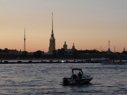 The Neva river and the Peter and Paul Fortress with the Peter and Paul Cathedral, at sunset