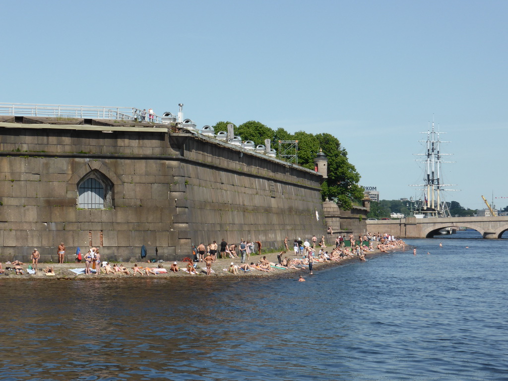 View from Commandant`s Landing on the outer wall of the Peter and Paul Fortress and the Troitsky Bridge over the Neva river