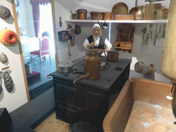 Wax statue in a kitchen, at the exhibition `History of the Petersburg - Petrograd` at the Commandant`s House at the Peter and Paul Fortress