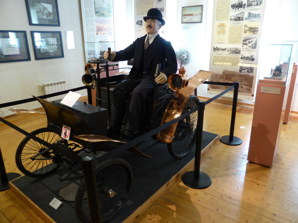 Was statue on an old automobile, at the exhibition `History of the Petersburg - Petrograd` at the Commandant`s House at the Peter and Paul Fortress