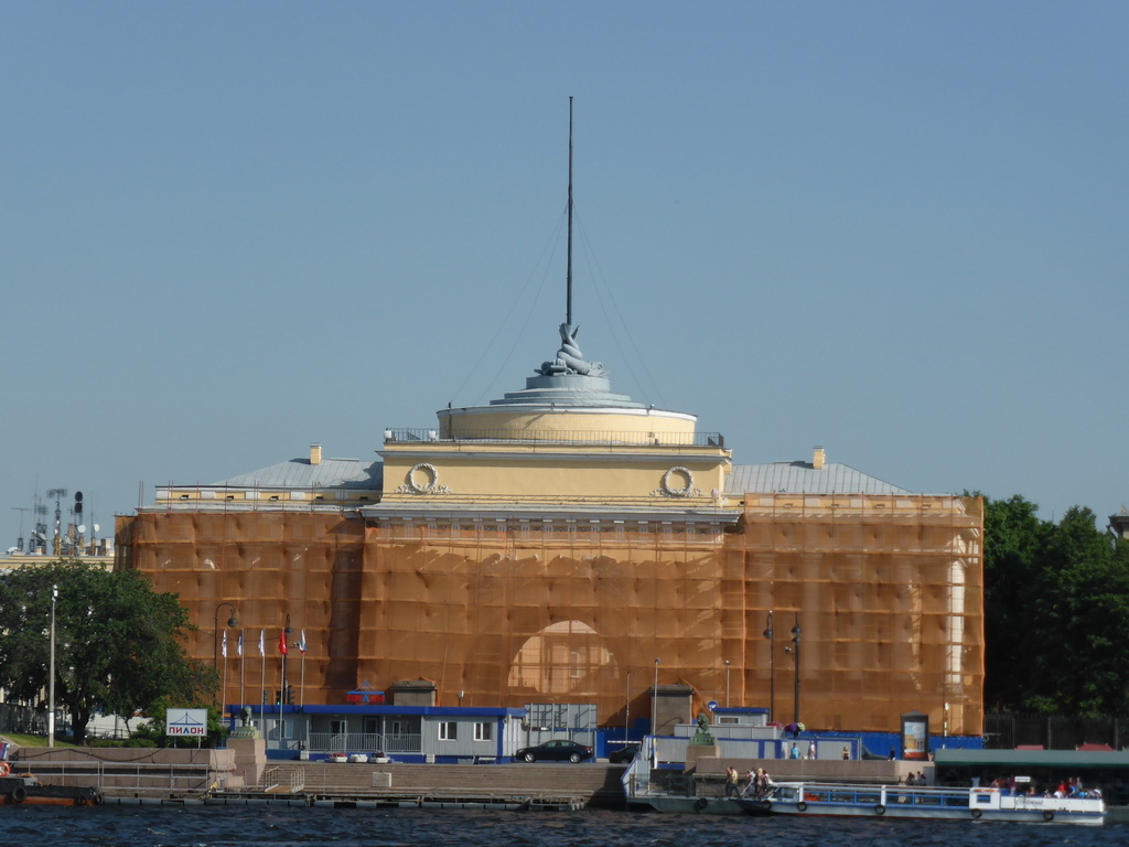 Boats in the Neva river and the east side tower of the Admiralty