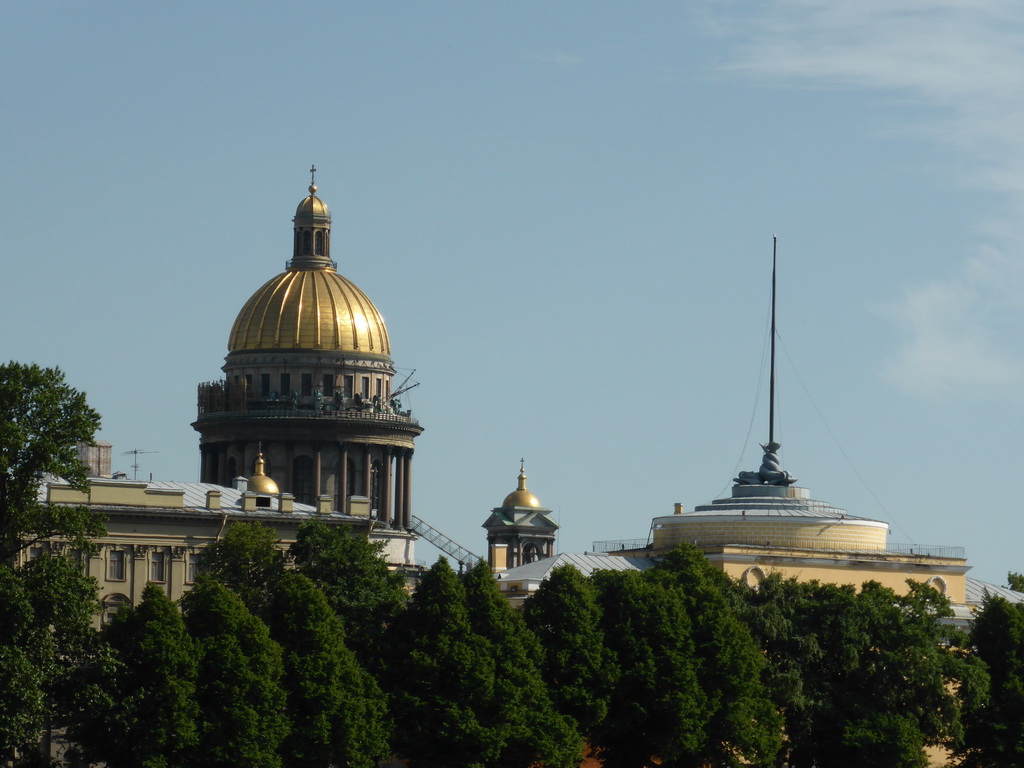 The west side tower of the Admiralty and the dome of Saint Isaac`s Cathedral