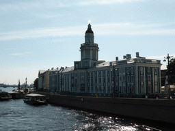 Boats in the Neva river and the Universitetskaya Embankment with the Kunstkamera museum