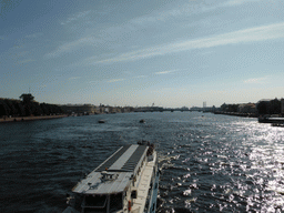 Boat in the Neva river, viewed from the Palace Bridge over the Neva river
