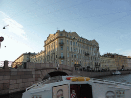 Buildings at the Moika river embankment and the Second Winter Bridge over the Winter Canal, viewed from the tour boat