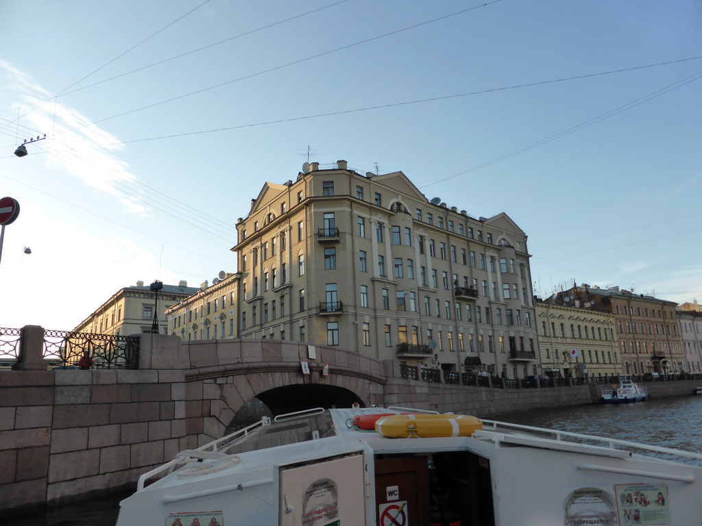 Buildings at the Moika river embankment and the Second Winter Bridge over the Winter Canal, viewed from the tour boat