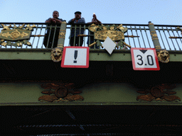 Men on the Panteleymonovsky Bridge over the Fontanka river, viewed from the tour boat