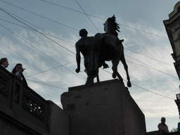 Statue at the Anichkov Bridge over the Fontanka river, viewed from the tour boat