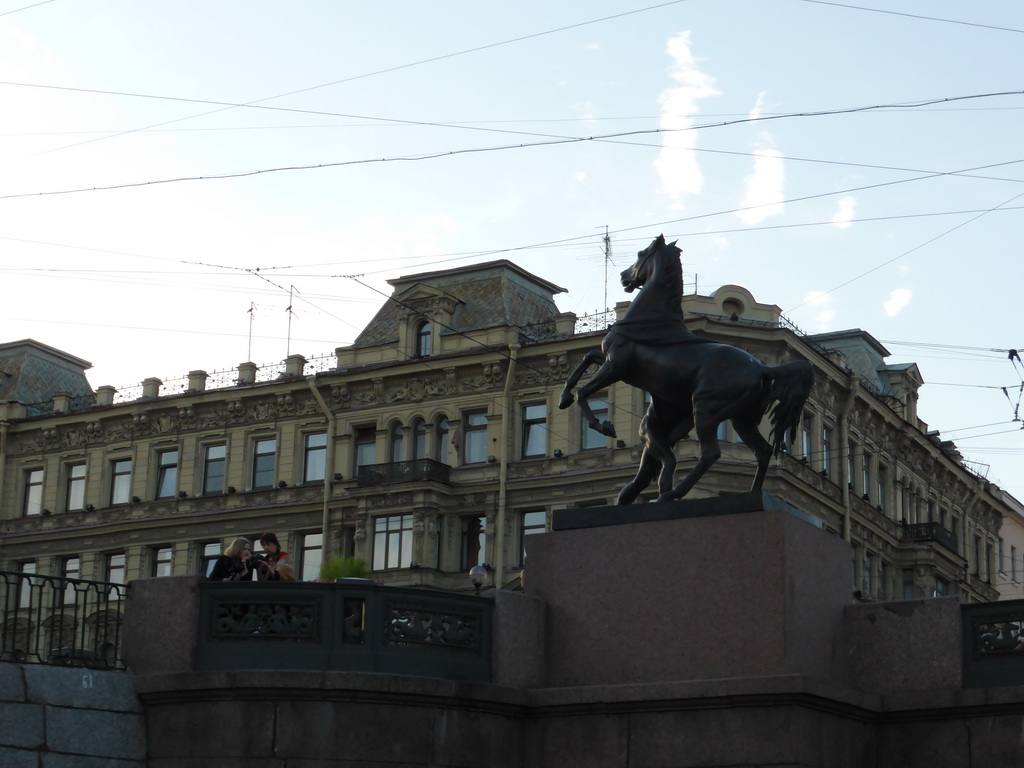 Statue at the Anichkov Bridge over the Fontanka river, viewed from the tour boat