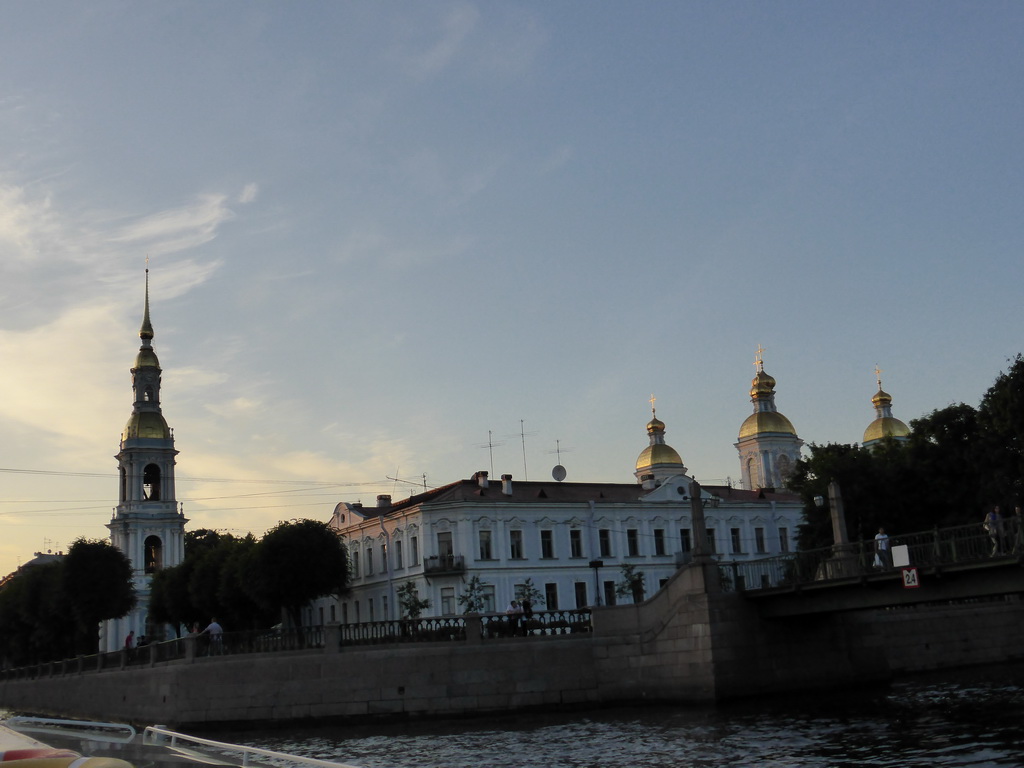 The Kryukov canal, a pedestrian bridge over the Griboyedov canal and the Naval Epiphany Cathedral of St. Nicholas, viewed from the tour boat