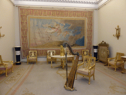 Harp, tapestry and furniture in a room at the First Floor of the Winter Palace of the State Hermitage Museum