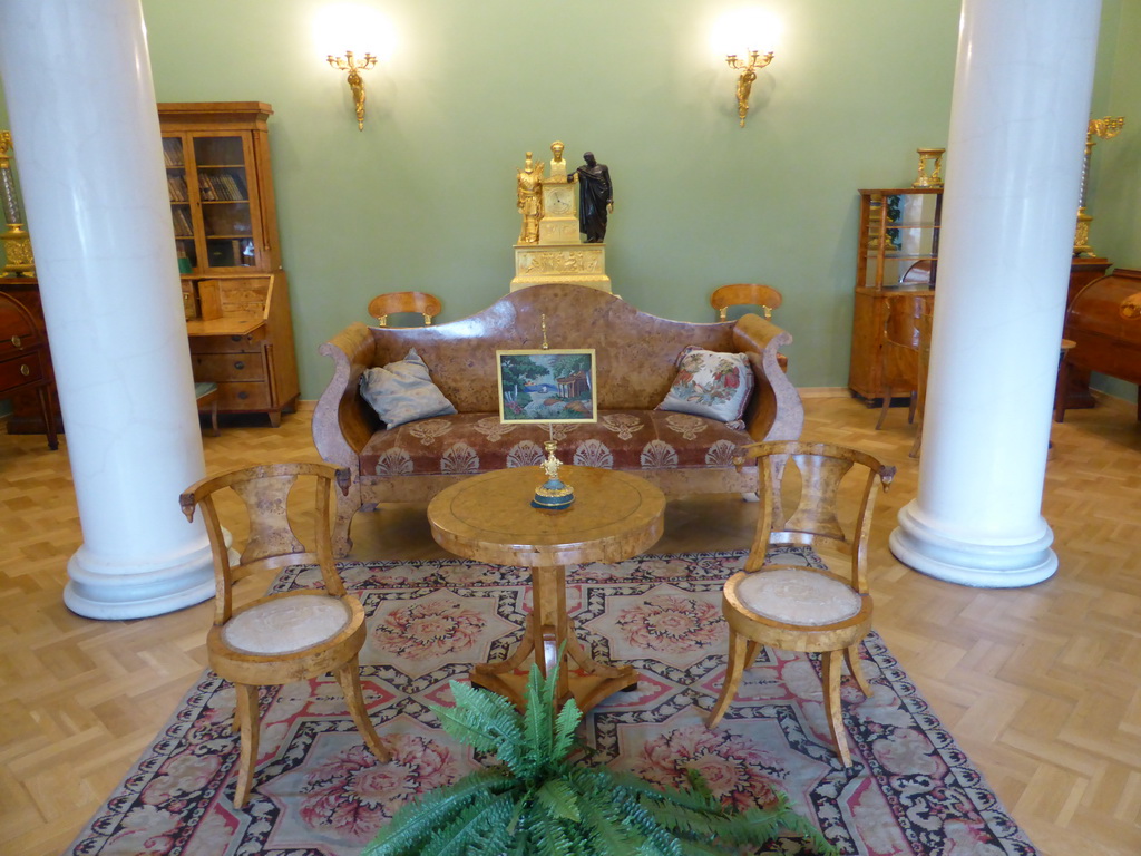 Furniture, clock and painting in a room at the First Floor of the Winter Palace of the State Hermitage Museum