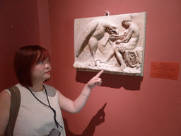 Miaomiao with a Roman relief in a hallway at the Ground Floor of the Small Hermitage of the State Hermitage Museum