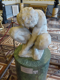 Sculpture `Crouching Boy` by Michelangelo at the Italian Cabinet at the First Floor of the New Hermitage of the State Hermitage Museum