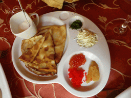 Pancakes with caviar at the Holst Maslo restaurant at the Bolshaya Morskaya Street
