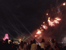 The Shtandart frigate in the Neva river and fireworks during the Scarlet Sails celebration at the Dvortsovaya street, by night