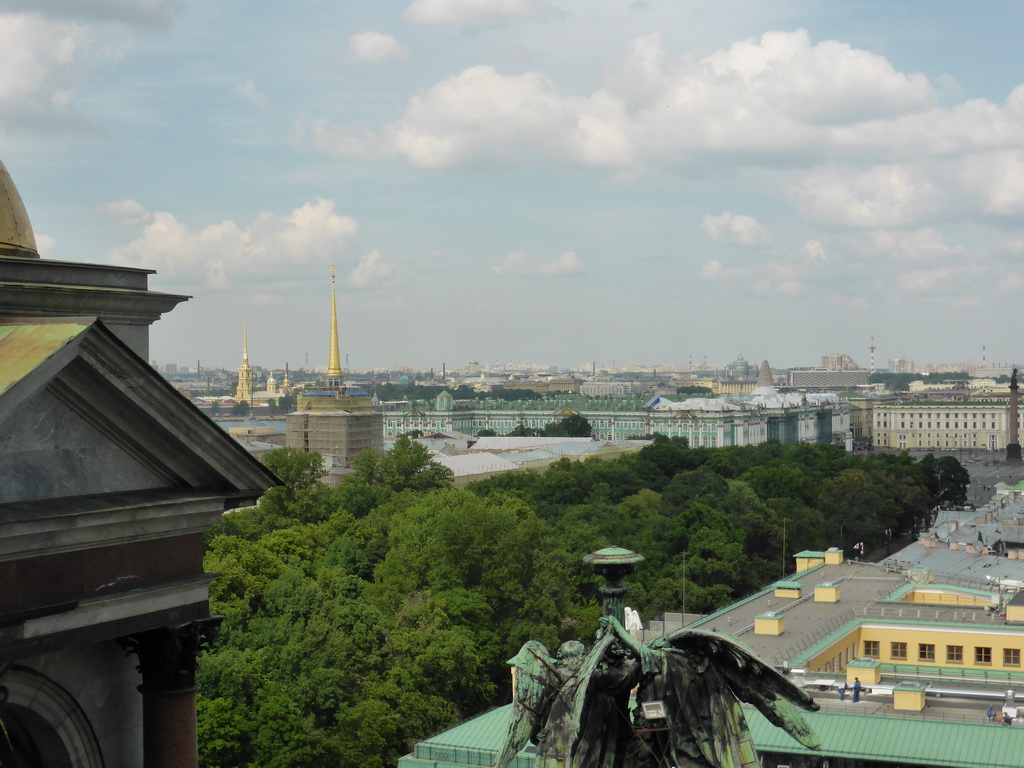 The northeast side of the city with the Aleksandrovsky Garden, the tower of the Admiralty, the Winter Palace of the State Hermitage Museum, the tower of the Peter and Paul Cathedral at the Peter and Paul Fortress and Palace Square with the Alexander Column, viewed from the roof of Saint Isaac`s Cathedral