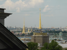 The northeast side of the city with the towers of the Admiralty and the tower of the Peter and Paul Cathedral at the Peter and Paul Fortress, viewed from the roof of Saint Isaac`s Cathedral