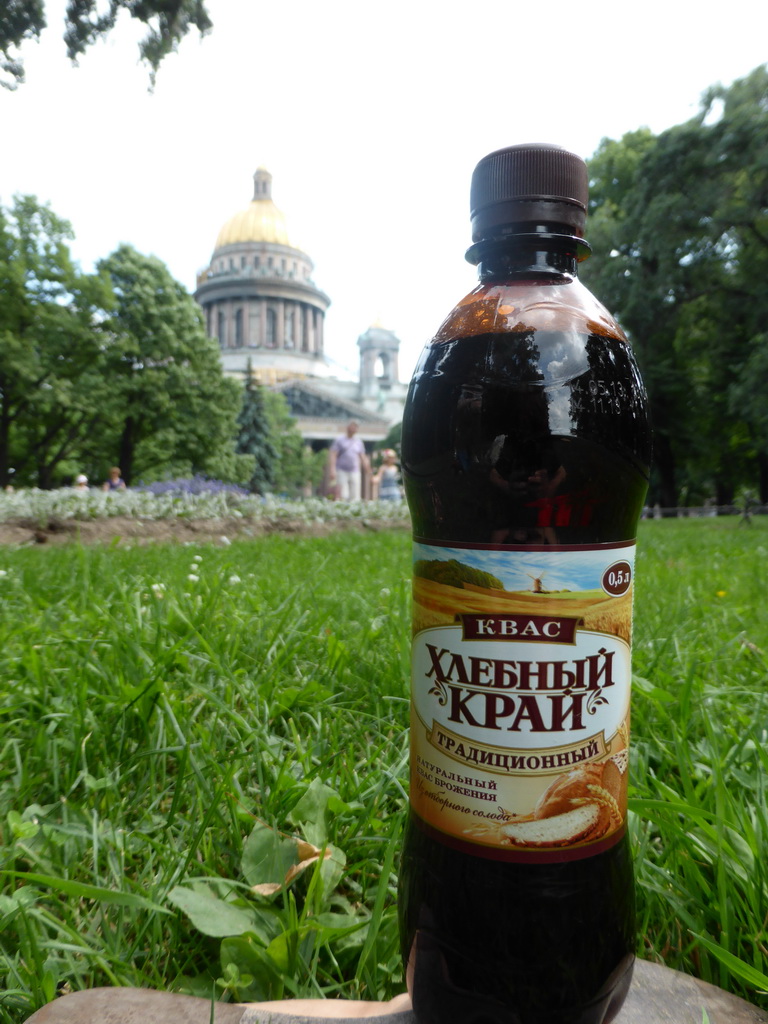 Bottle of kvass with a view on the Alexander Garden and Saint Isaac`s Cathedral