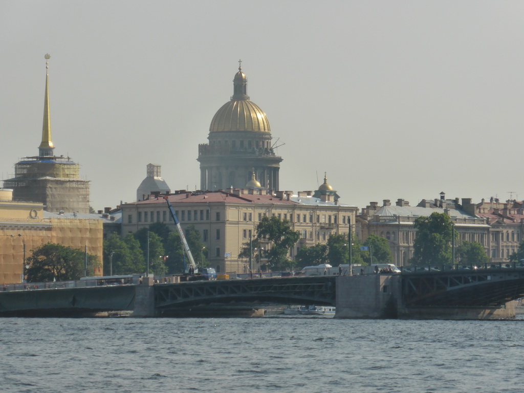The Palace Bridge over the Neva river, the tower of the Admiralty and the Dome of St. Isaac`s Cathedral, viewed from the hydrofoil from Peterhof