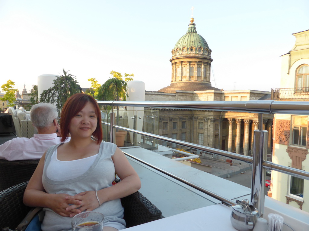 Miaomiao at the rooftop terrace of the Terrassa restaurant at Kazanskaya Square, with a view on the Kazan Cathedral