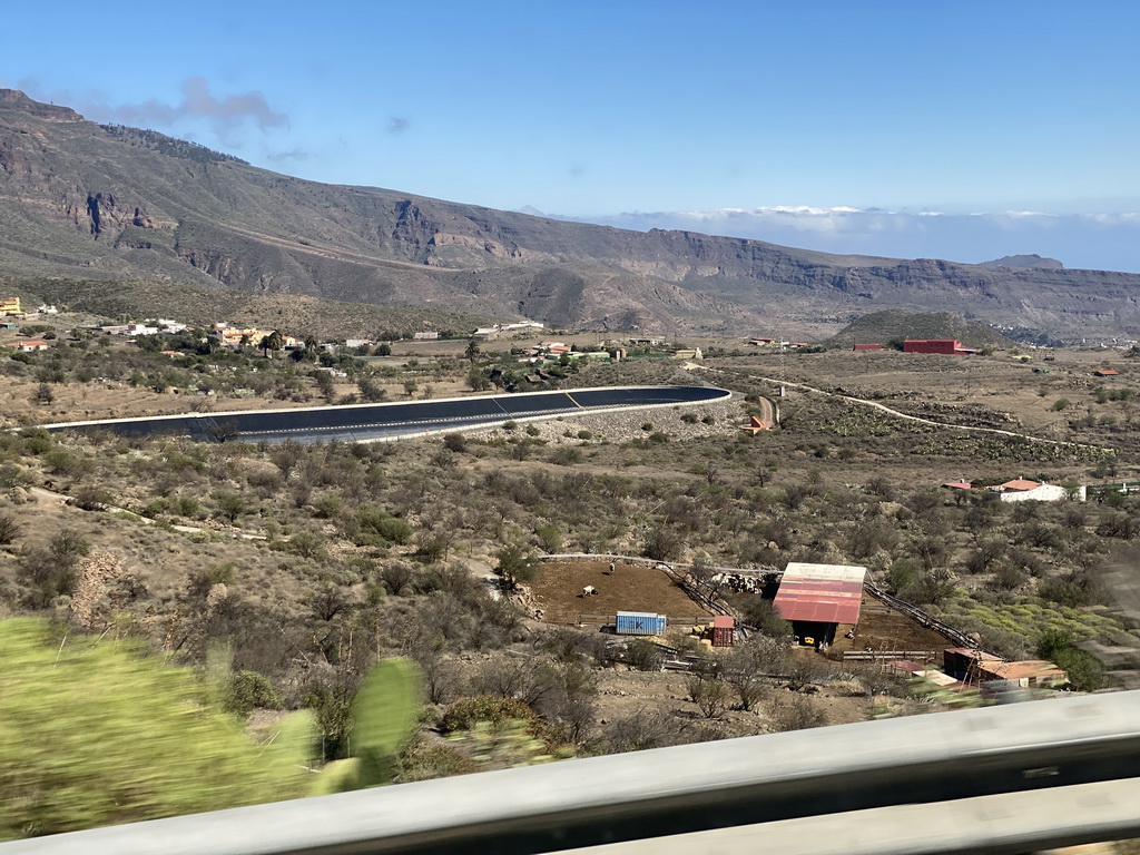 Water reservoir near the town of Agua Palente, viewed from the tour bus on the GC-60 road