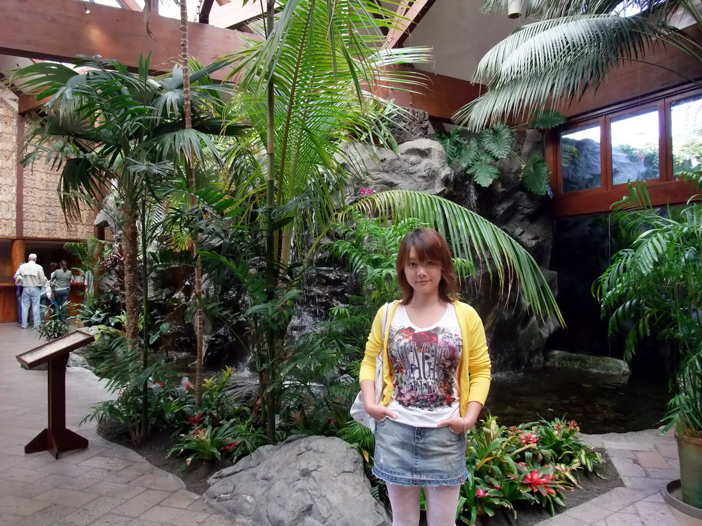 Miaomiao with plants and waterfall inside the Catamaran Resort Hotel and Spa