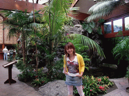 Miaomiao with plants and waterfall inside the Catamaran Resort Hotel and Spa