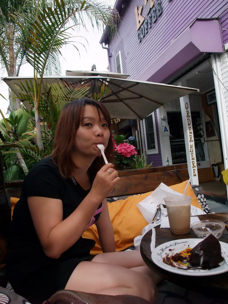 Miaomiao having cake and coffee at Kahve Coffee House at Mission Boulevard