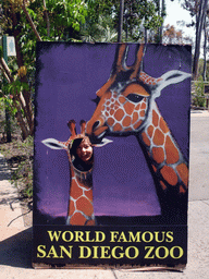 Mengjin in a Giraffe poster at San Diego Zoo