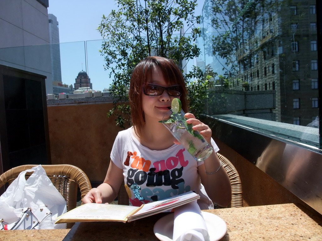 Miaomiao having a drink at the Cheesecake Factory restaurant at Macy`s department store