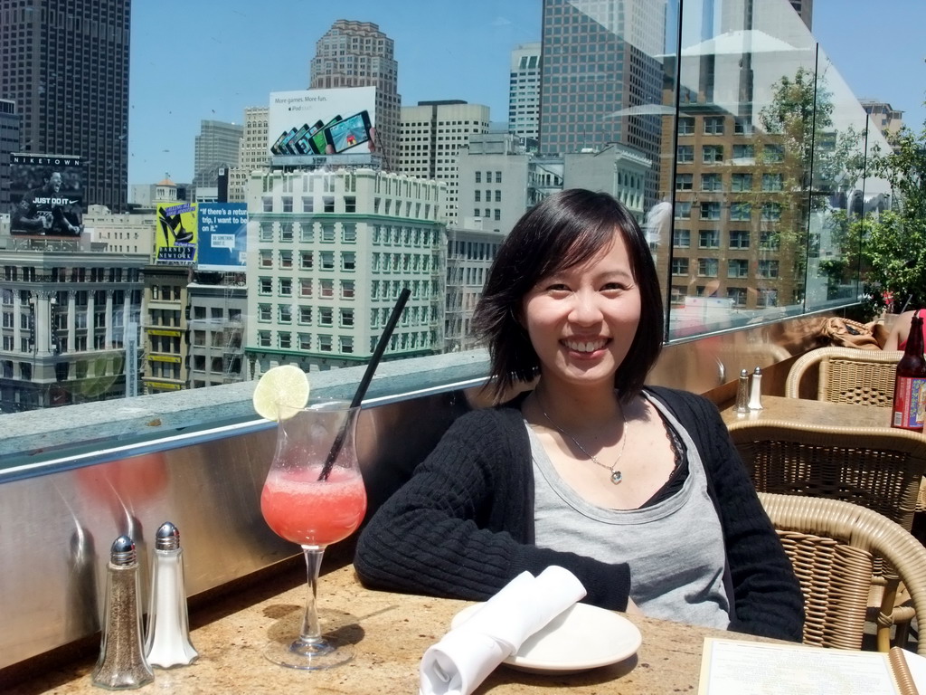 Mengjin having a drink at the Cheesecake Factory restaurant at Macy`s department store