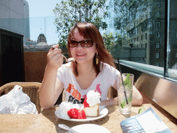 Miaomiao having cake with strawberry and cream, at the Cheesecake Factory restaurant at Macy`s department store