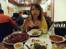 Miaomiao having dinner in a Chinese restaurant