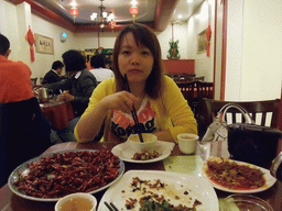 Miaomiao having dinner in a Chinese restaurant