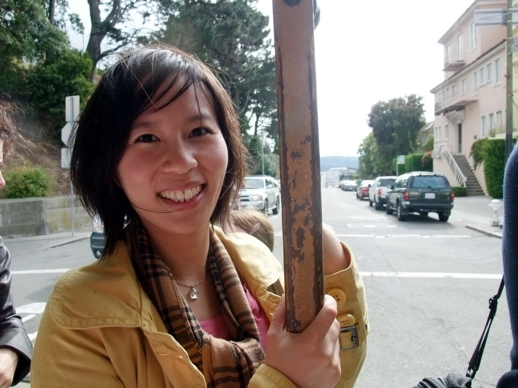 Mengjin in a tram at Hyde street