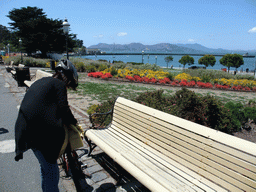 Mengjin with bike at the beach and pier of the Aquatic Park Historic District